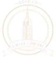 Logotipo da Burger Company: o Empire State dentro de um círculo, com a faixa Burger Company